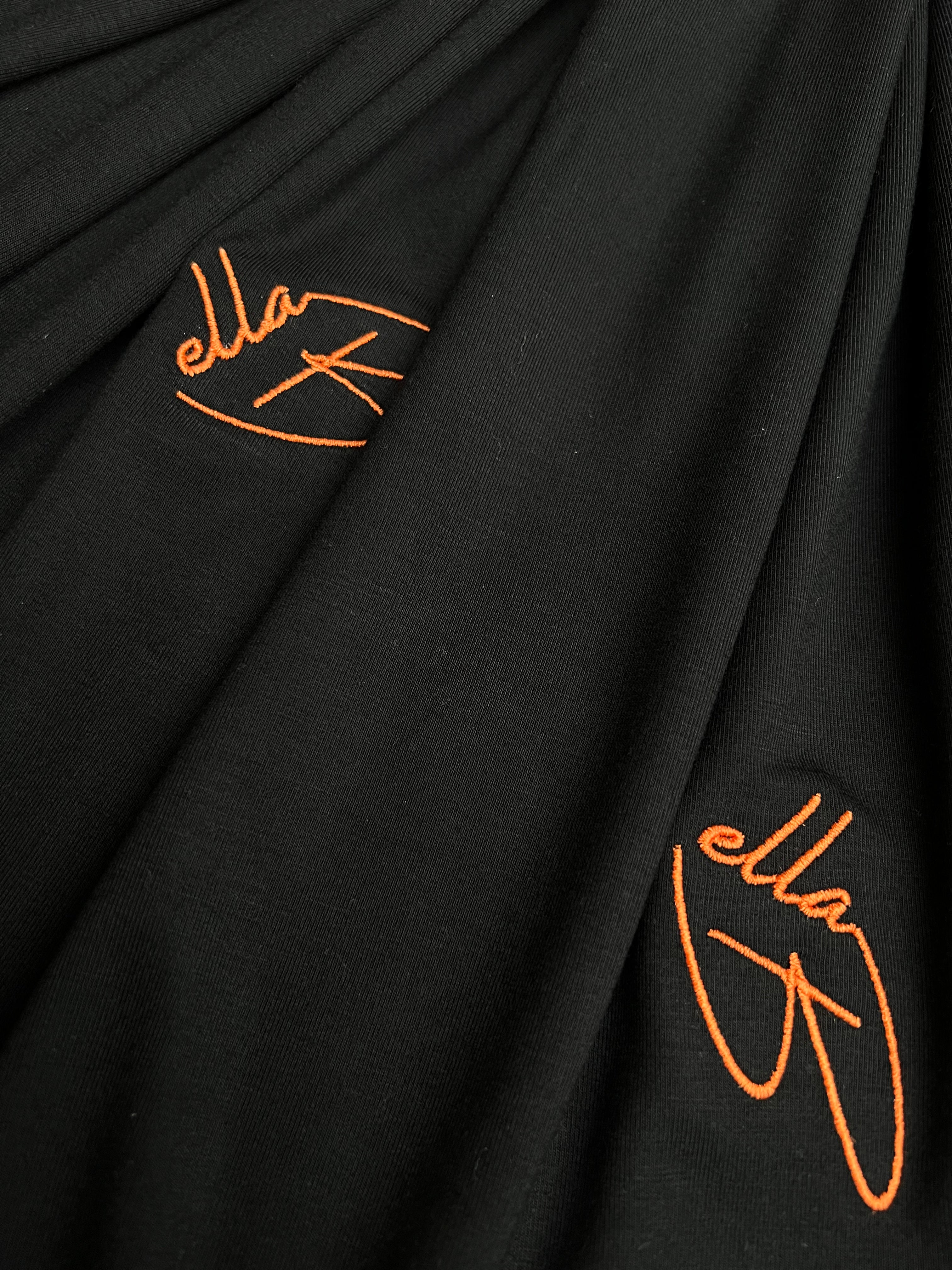 DEFINED NOIR X ORANGE